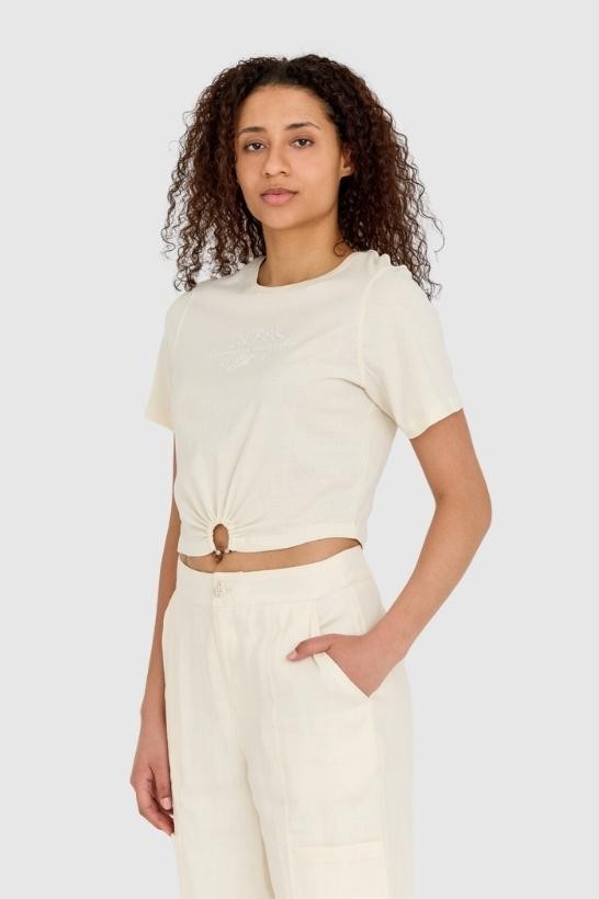 GUESS Kremowy t-shirt damski cropped fit piercing